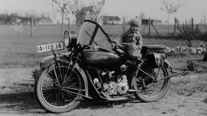 Vintage motorcycle and baby